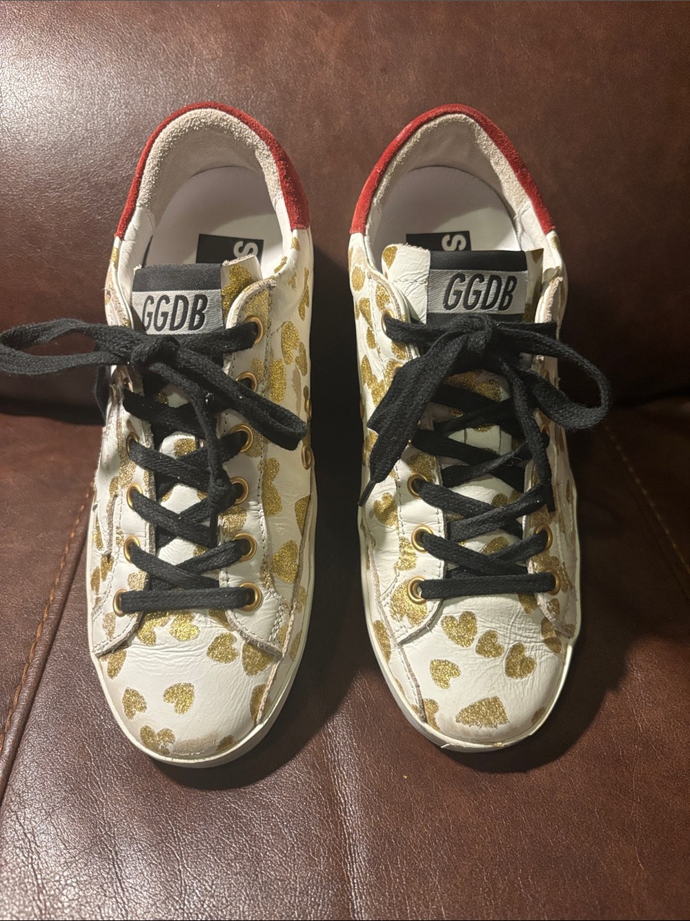 Golden Goose White Sneakers with Gold Heart Pattern and Red Collar